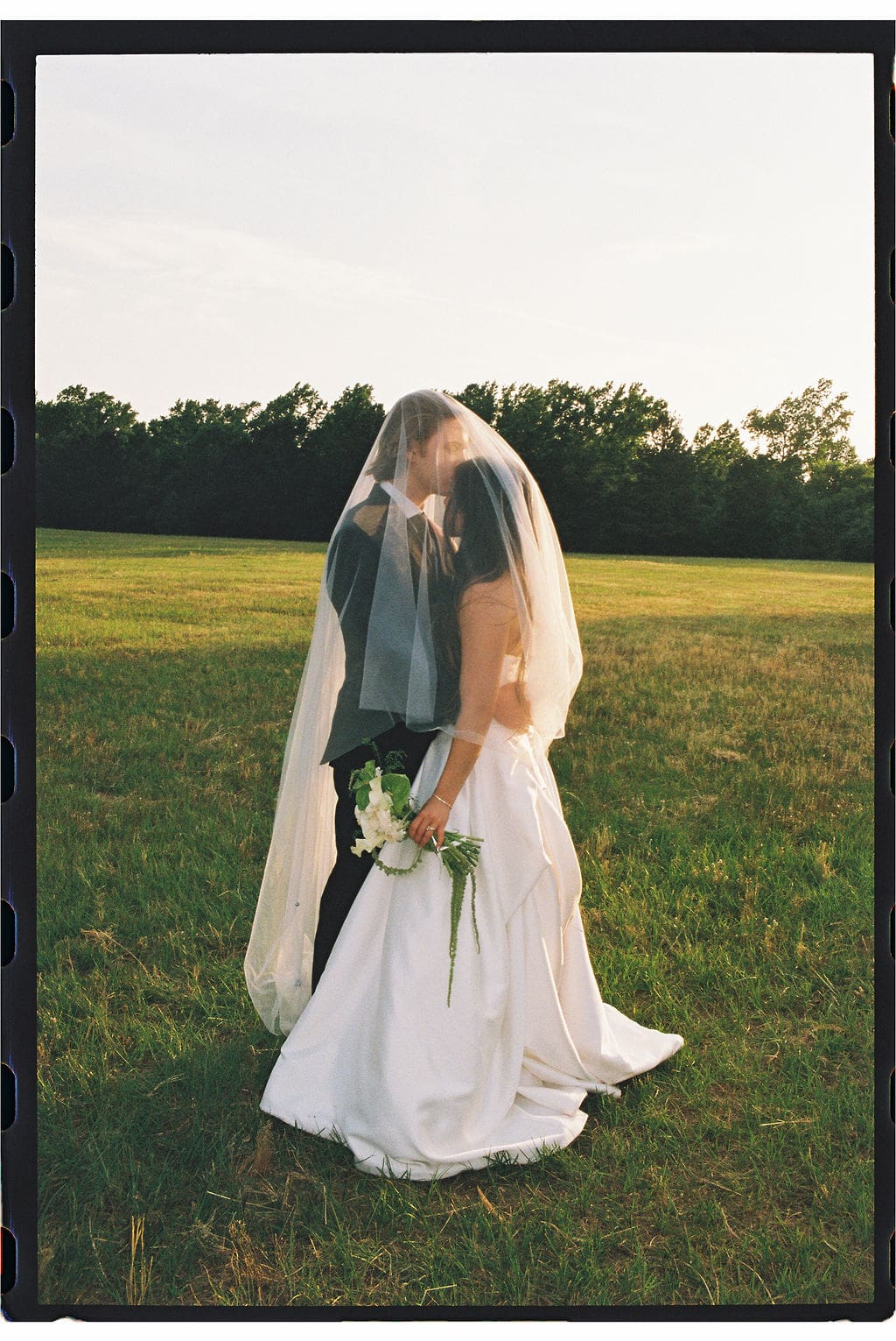 Jenna and Cy on their wedding day at Briar Rose Venue in Tyler Texas, photographed on film
